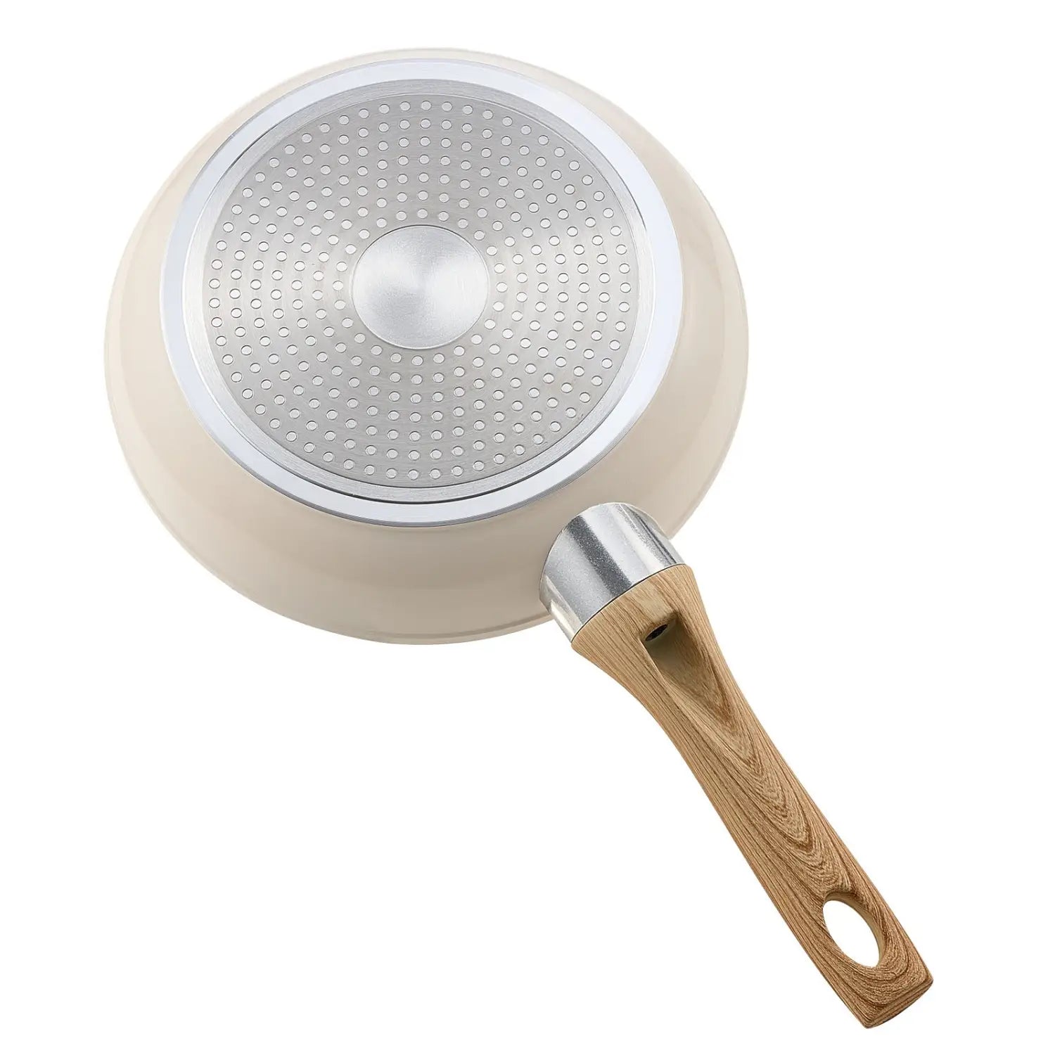 Cream-colored nonstick ceramic frying pan with wooden handle and silver metal accents from a 3 piece beige set.