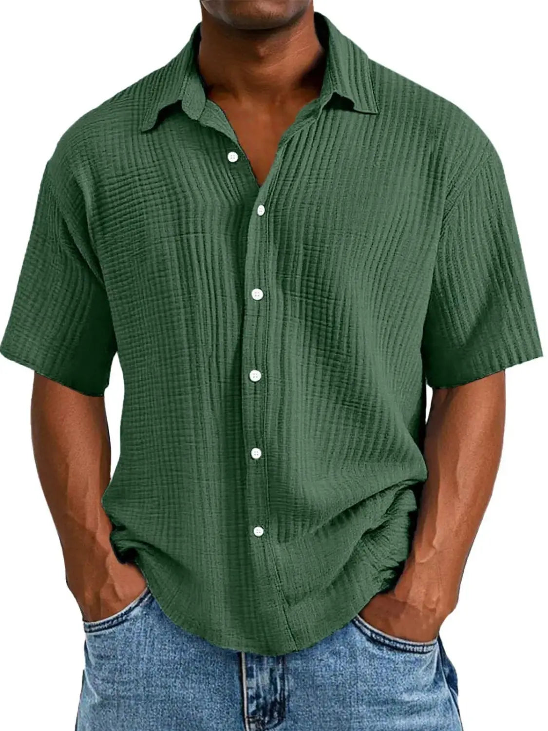 Men’s textured short sleeve button up shirt in dark green ribbed fabric with white buttons.