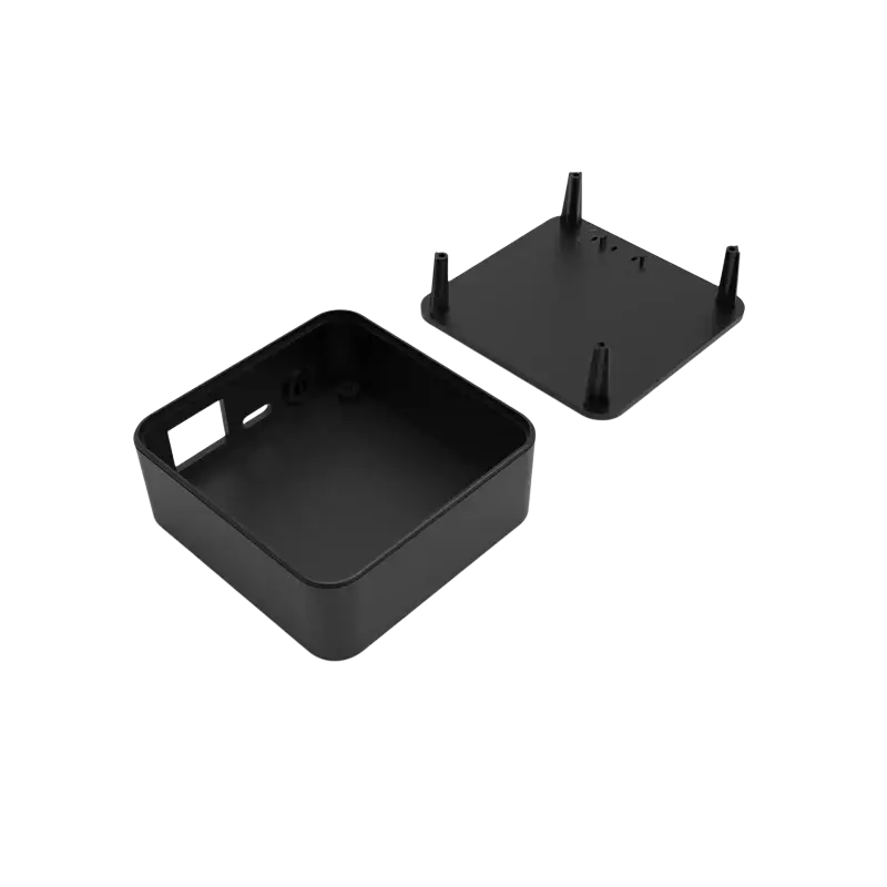 Black plastic 74x71x27mm wireless routing enclosure with integrated mounting feet and cutout openings made of ABS plastic