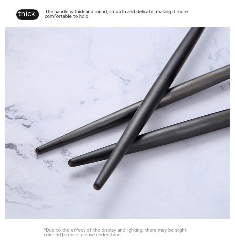 Matte black stainless steel chopsticks with a thick, round design and smooth matte finish from a 60 piece tableware set.