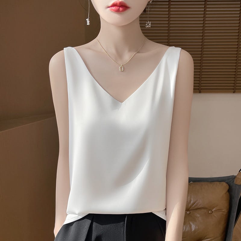 white satin sleeveless camisole top with v-neckline made from silky satin material