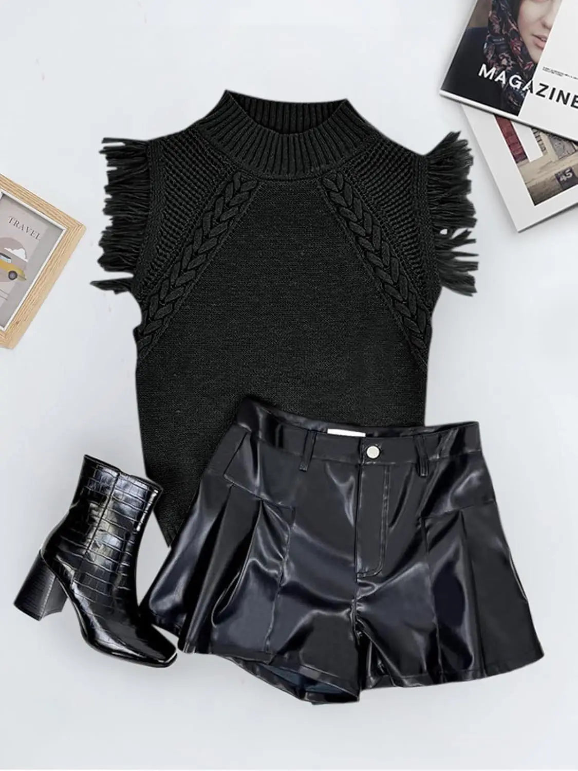 black hand-woven sleeveless knit sweater vest with fringed hem and braided detailing