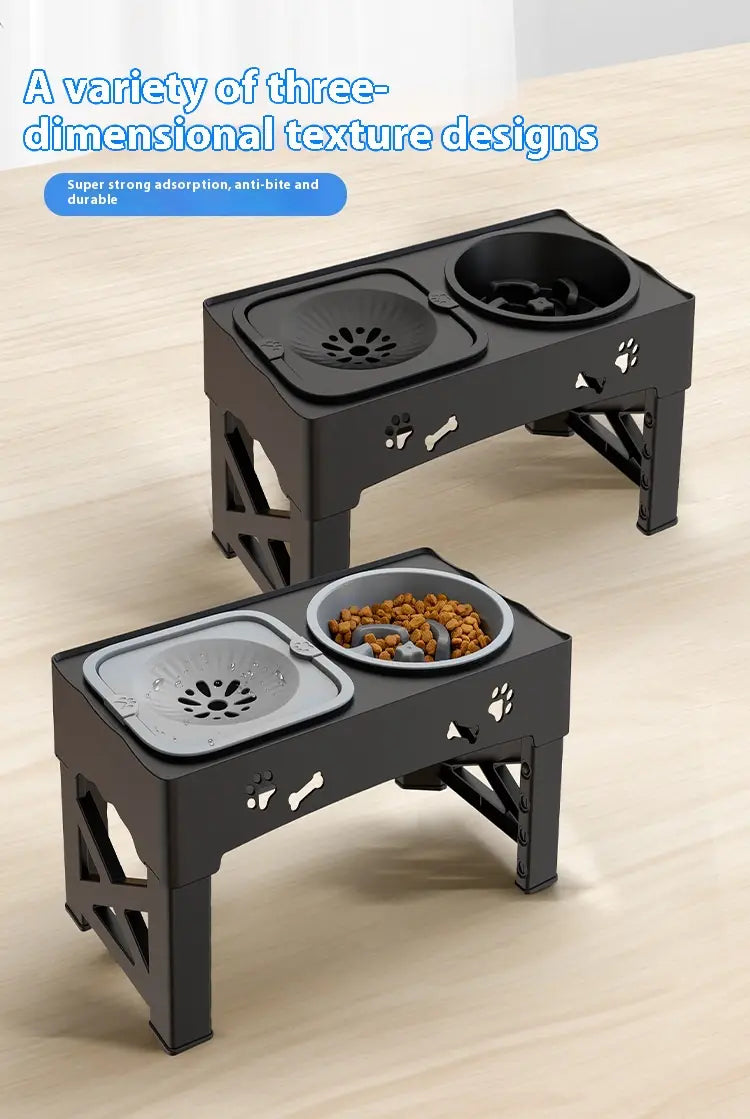 Bol d’alimentation pour animaux réglable double en acier inoxydable noir en plastique, avec des gamelles grises et noires, présentant des découpes en forme d’empreinte de patte et d’os sur les côtés.