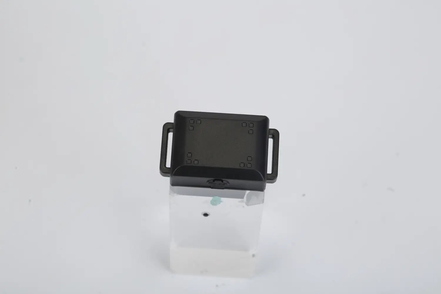 black plastic car phone mount with two side handles and a central mounting plate designed for the dog training collar 3280ft waterproof shock system