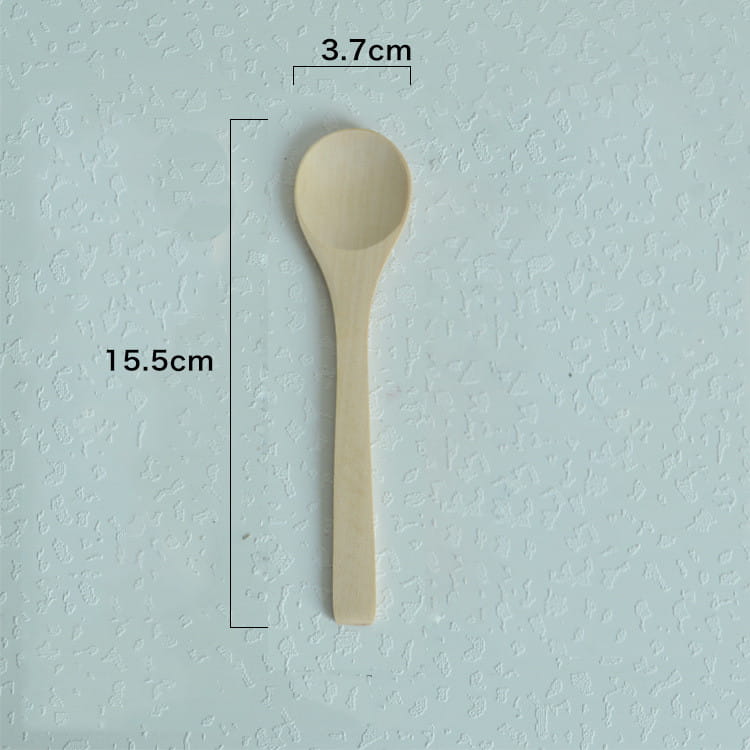 A light beige wooden spoon with a smooth rounded bowl and slender handle from a natural eco-friendly wooden spoon set for kitchen utensils.
