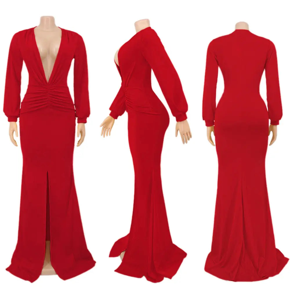 A vibrant red velvet v-neck evening dress featuring a long-sleeved mermaid style with a deep v-neckline and side slit.