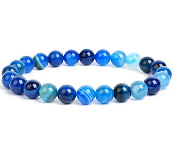 Unisex 8mm polished agate and amethyst stretch bracelet featuring smooth round blue agate stones with natural swirling patterns in deep and light blue shades.