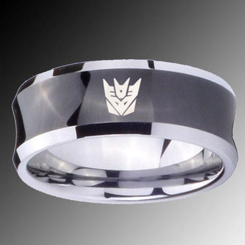 Black tungsten wedding ring with green aluminum 8mm featuring a silver and black tungsten carbide design with a polished central band engraved with an autobot logo.
