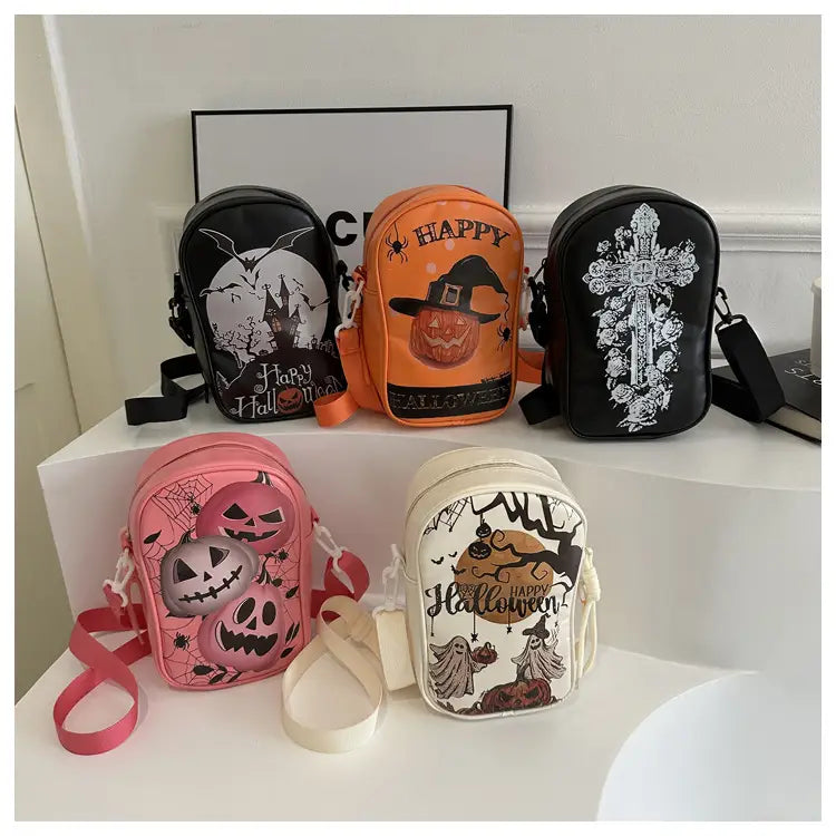Embroidered Halloween floral and pumpkin crossbody bags in vibrant orange pink and black featuring spooky designs of pumpkins witches ghosts and crosses.