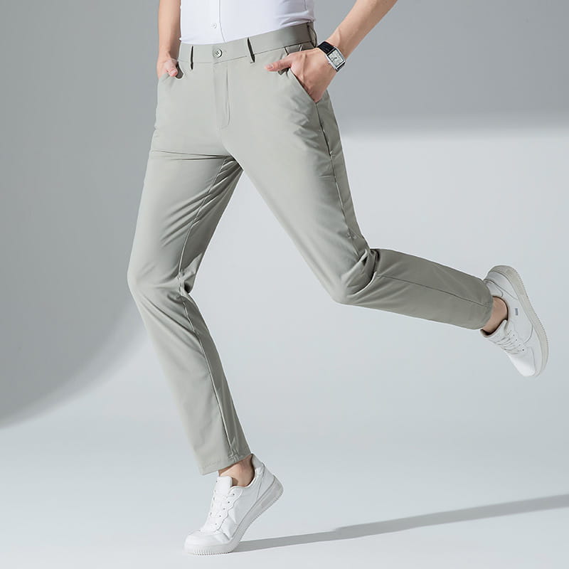Men plus size stretch casual pants in light gray slim-fit chino style with subtle texture and clean stitching.