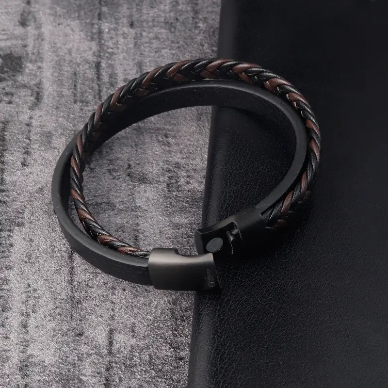 men’s braided leather bracelet in black with a magnetic clasp showcasing its braided design and secure closure.