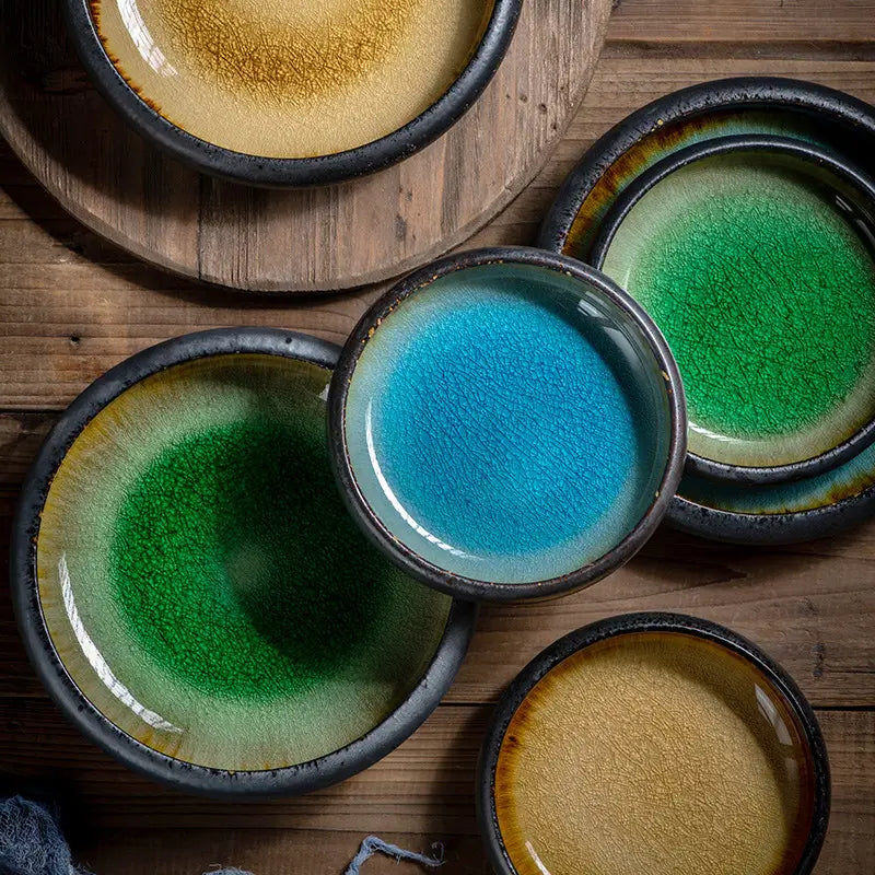Handcrafted ceramic bowl kiln glazed bone china round plates featuring glossy crackled glazes in vibrant blue and green hues.