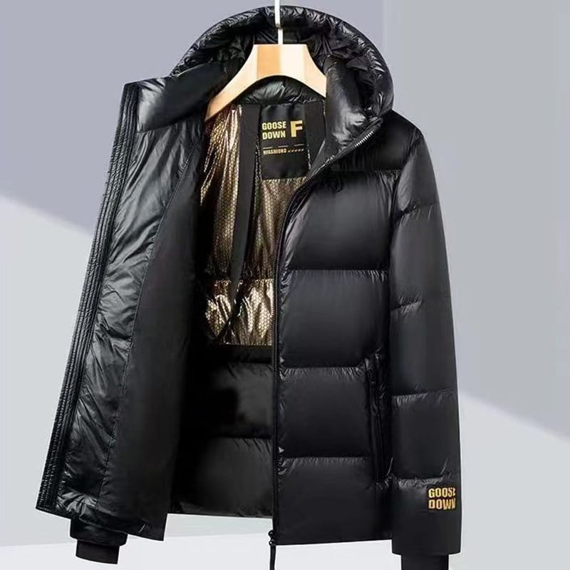Chaqueta acolchada tipo puffer de oro negro con exterior negro brillante y forro interior con ribetes dorados