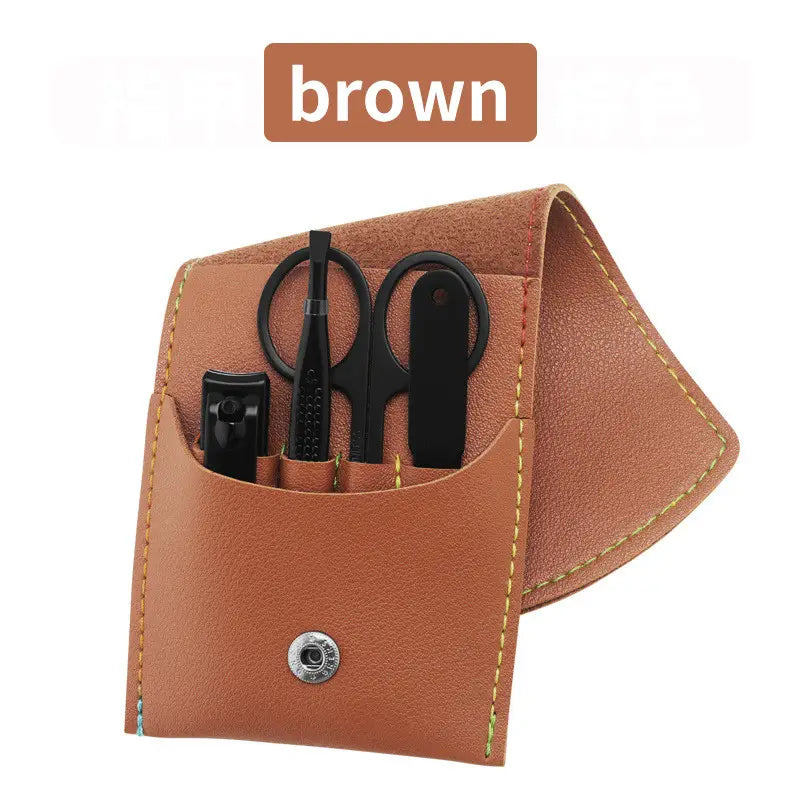 Brown leather 16 piece professional manicure and pedicure kit with black tools and yellow stitching.