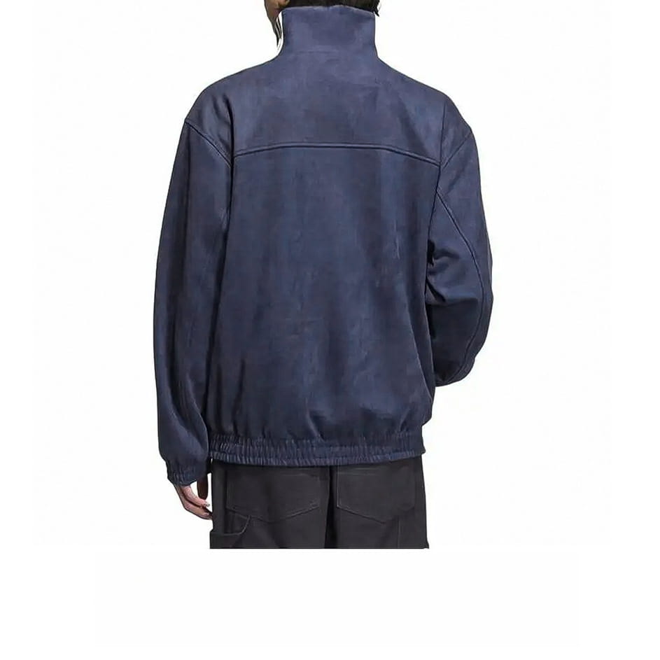 Tang style fleece sport jacket in dark blue featuring a slightly textured fabric, high collar, and elasticated waistband.