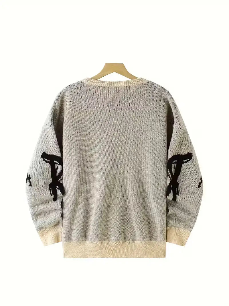 Herren-Halloween-Weihnachtsurlaub-Pullover aus grauem Strick mit schwarzen abstrakten Grafiken auf den Ärmeln sowie cremefarbener gerippter Rundhalsausschnitt und Bündchen.