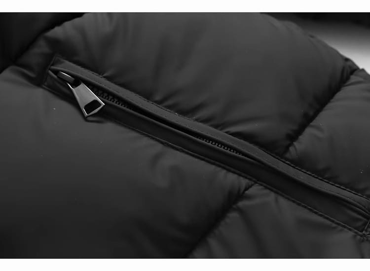 Black hooded puffer cotton coat featuring a sleek metallic zipper pull.