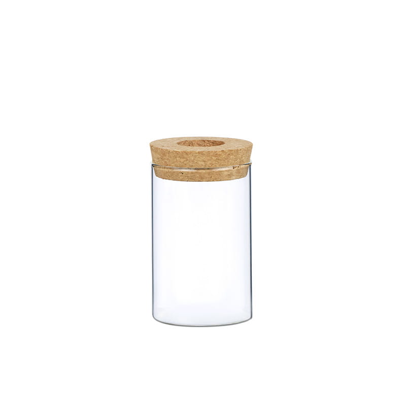 clear glass hydroponic vase with natural cork lid for plants made of transparent glass and cork material.