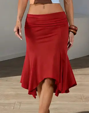 Red high waisted irregular fishtail midi skirt featuring a flared hem and gathered waistband.