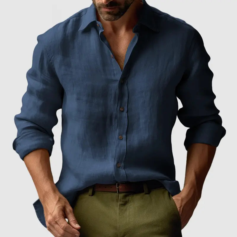 Men’s slim fit navy blue linen blend button-down shirt with rolled-up sleeves and classic collar ideal for casual wear.