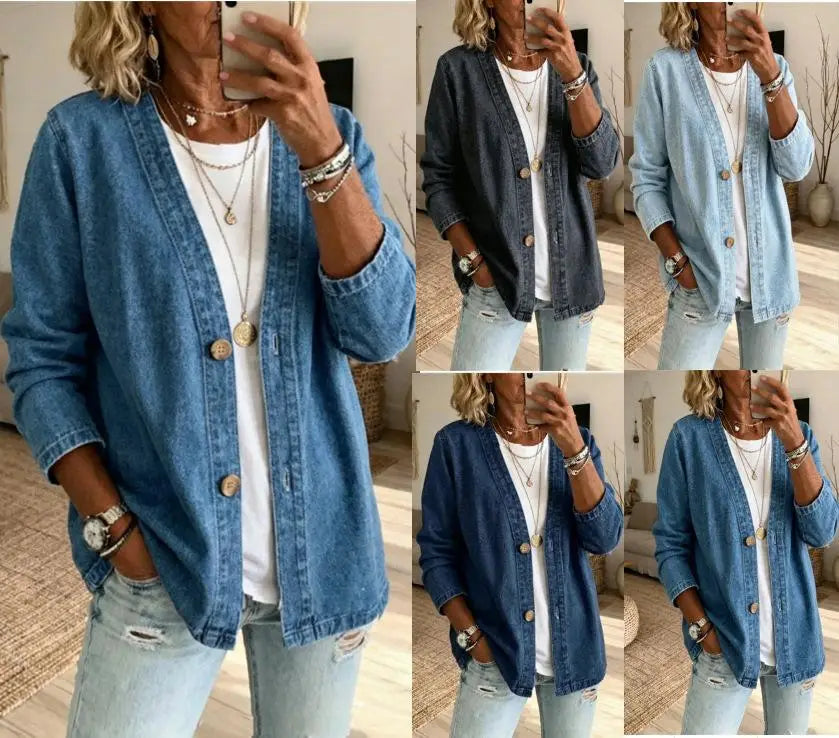 Denim cardigan jacket womens v-neck button down in medium blue denim with button closures and rolled cuffs.