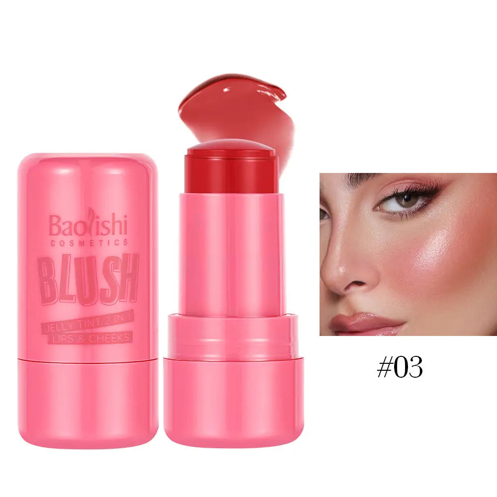 Pink baoishi cosmetics jelly blush stick shimmer lip and cheek tint in shade 03 features a glossy finish and sleek cylindrical design weighing 26.5g.