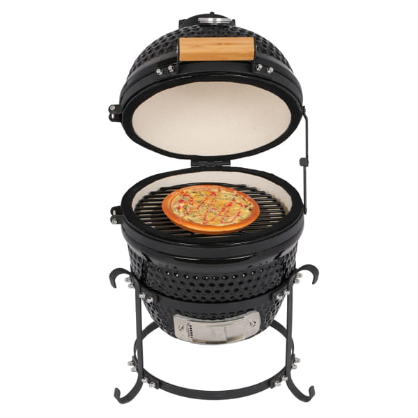 Black ceramic kamado charcoal grill with a wooden handle on the lid cooking a pizza inside, 13 inch ceramic kamado grill black.
