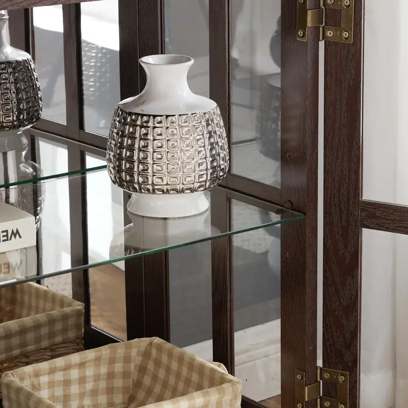 led curio display cabinet with adjustable shelves featuring a white ceramic vase with a textured silver-toned geometric pattern