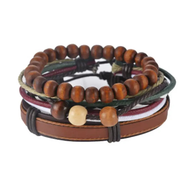 Handmade multilayer braided leather and wood bead bracelet stacked in earthy tones with leather and wood materials.