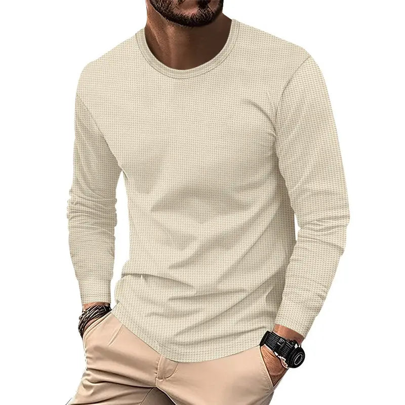 Beige men’s long sleeve waffle knit thermal pullover shirt featuring a subtle waffle knit texture and a crew neck design.