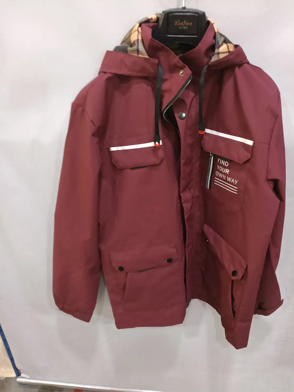 Men winter hooded parka coat in maroon with white stripe accents and a plaid-lined collar for cold weather protection.