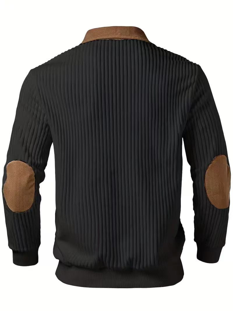 Men’s black ribbed knit sweater featuring brown leather patches on the elbows and collar with a half zip design.