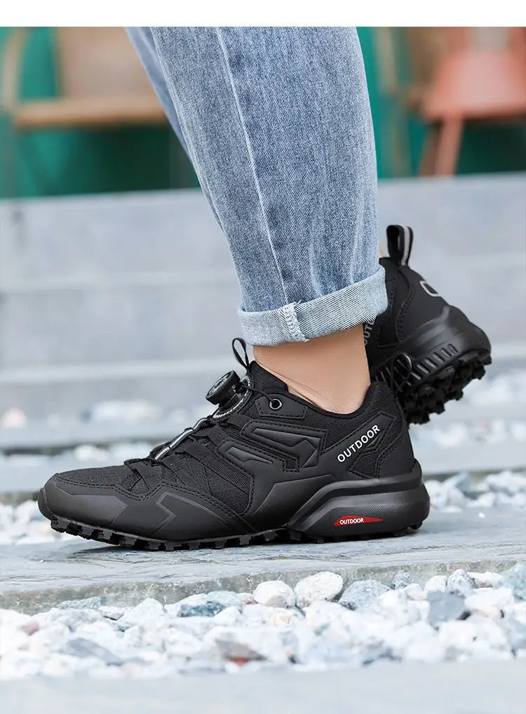 Black Salomon X111 lightweight off-road breathable hiking shoe with a textured rubber sole and reinforced upper for outdoor use.