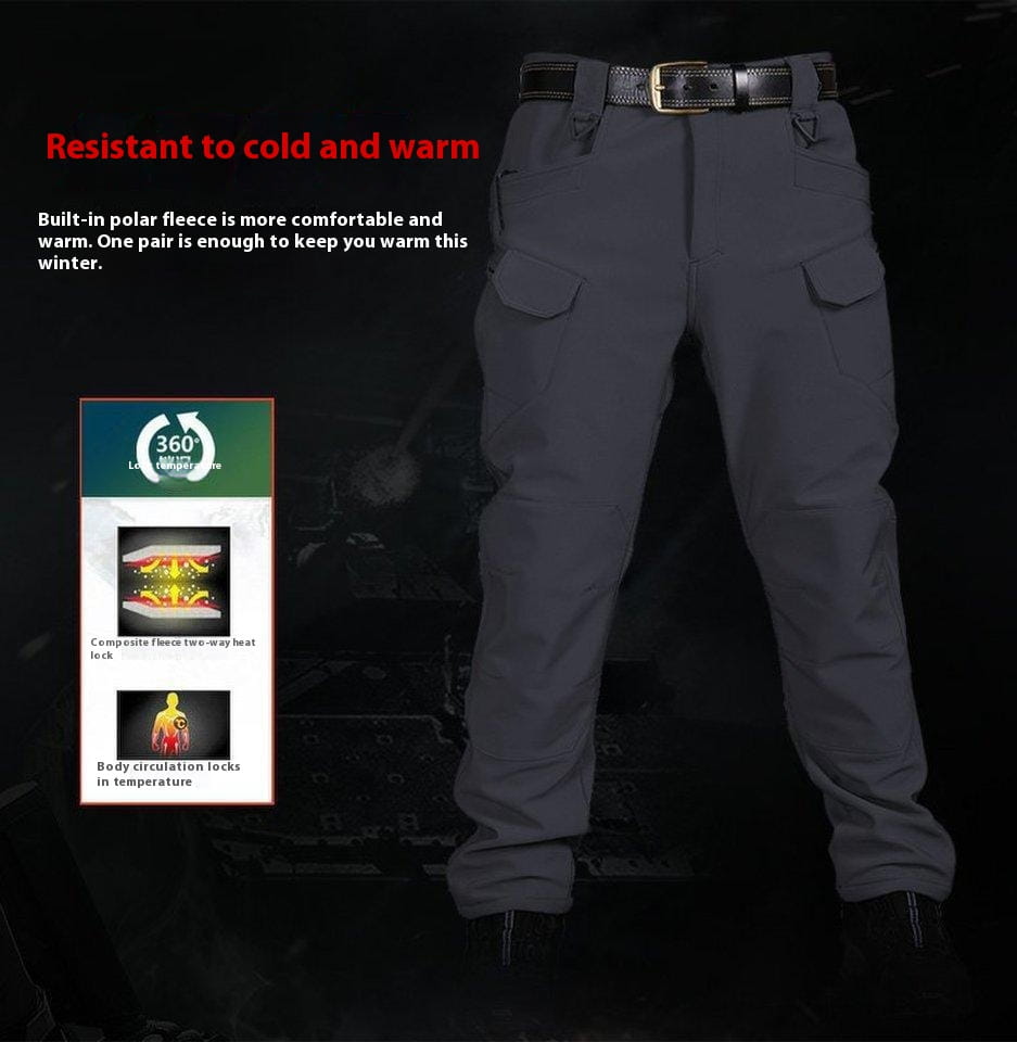 Men’s fleece-lined waterproof tactical pants in gray with multiple cargo pockets and a black belt.