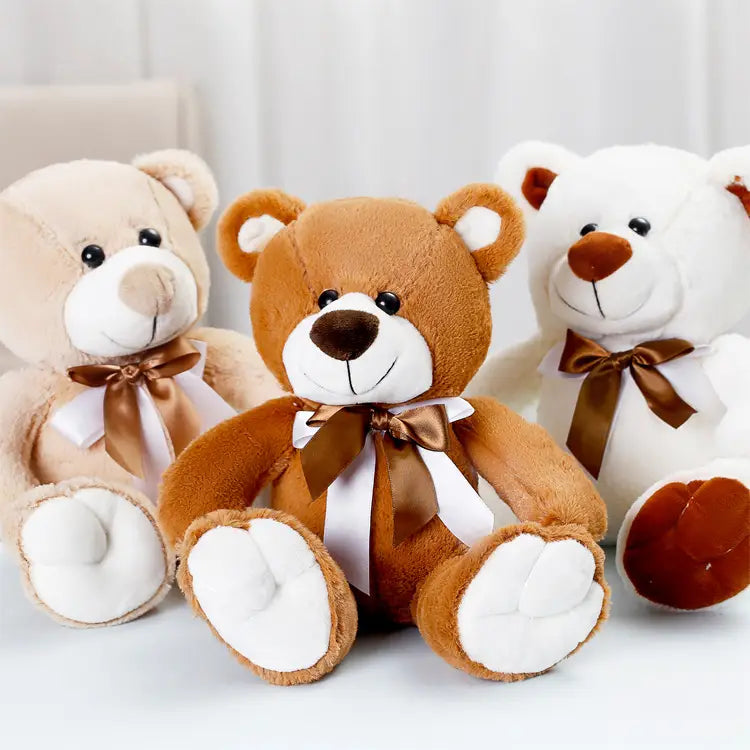 Weicher brauner Plüsch-Teddybär mit weißen Pfoten und einer schokoladenbraunen Nase, verziert mit einer Satinband-Schleife, 25 cm großes Puppen-Plüschtier.