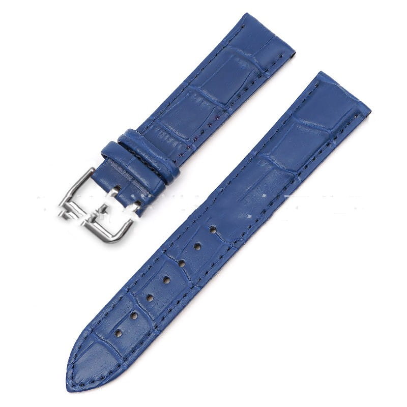 Blue crocodile-patterned leather watch strap with silver-toned buckle in a crocodile leather watch strap set with buckle.