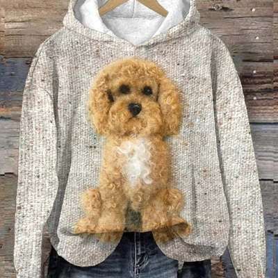A cozy beige textured men’s graphic print pullover hooded sweatshirt featuring a detailed 3d-printed tan poodle graphic on the front.