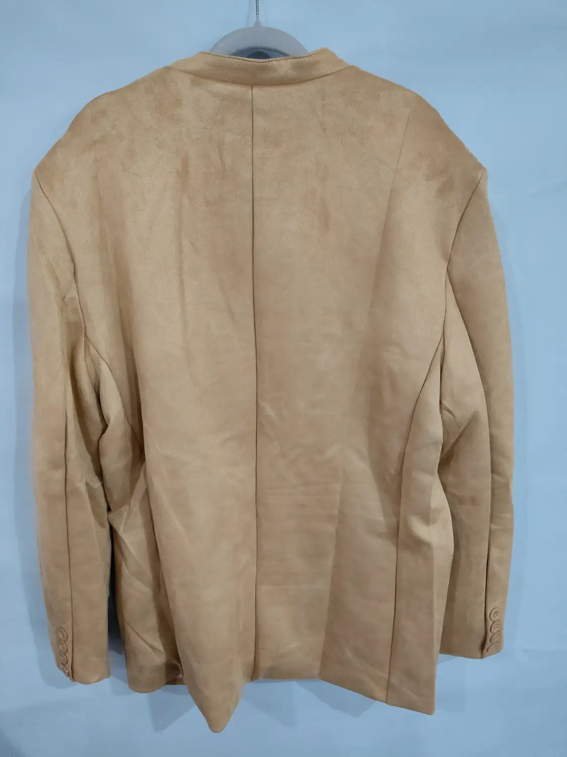 Men’s brown suede business casual blazer jacket in a tan color with a classic fit and buttoned cuffs.