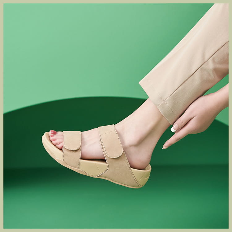 Beige suede-look women’s platform sport sandals with cushioned contoured sole and velcro straps.