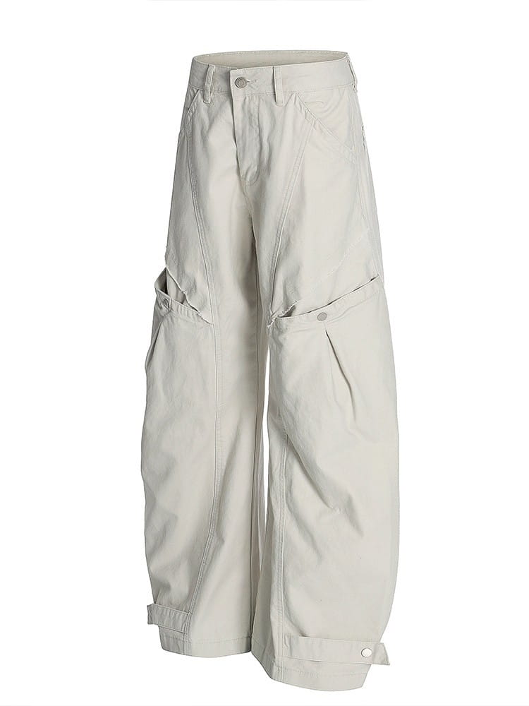 Beige wide-leg cargo pants with multiple pockets designed for casual and practical wear.