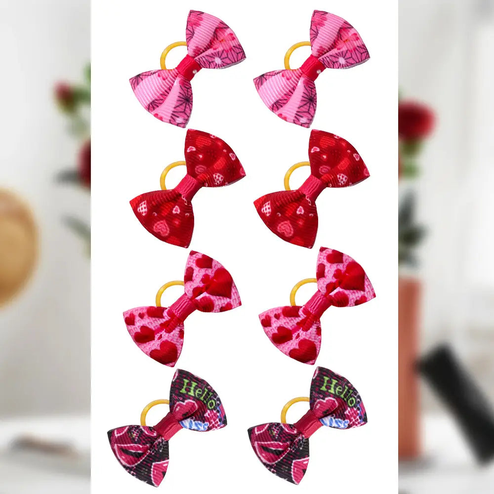 Plaid pet bows featuring pink and red heart-patterned fabric with yellow elastic bands designed as colorful dog hair accessories.