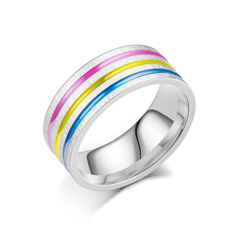 A sleek silver-toned stainless steel unisex band ring with a brushed metal finish and three vibrant horizontal stripes in pink yellow and blue enamel.