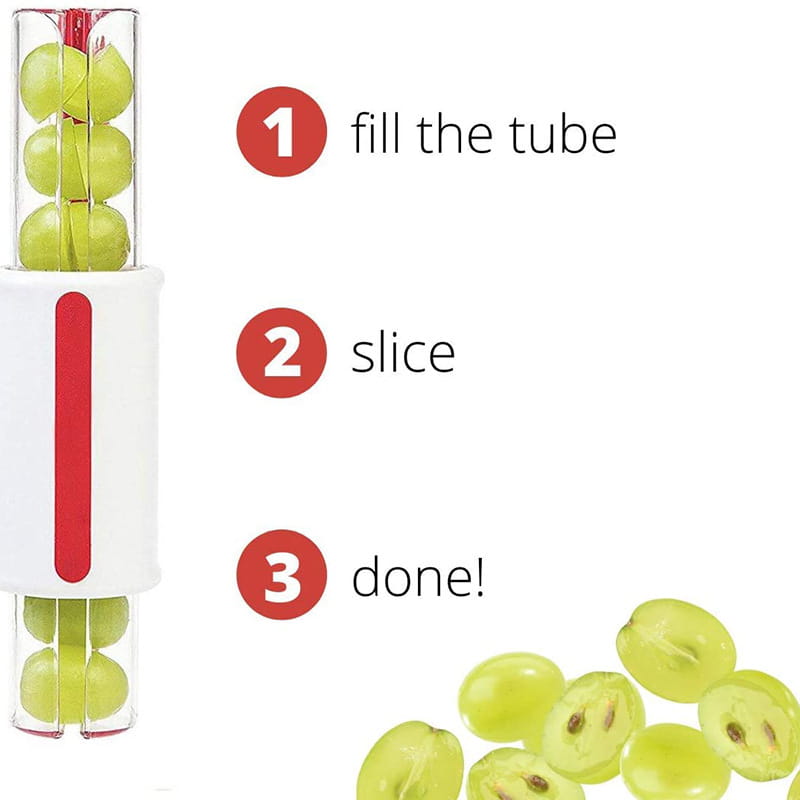 Tube en verre transparent trancheur pour raisin et tomate, avec base en plastique blanc et poignée rouge, conçu pour trancher des raisins et de petits fruits.