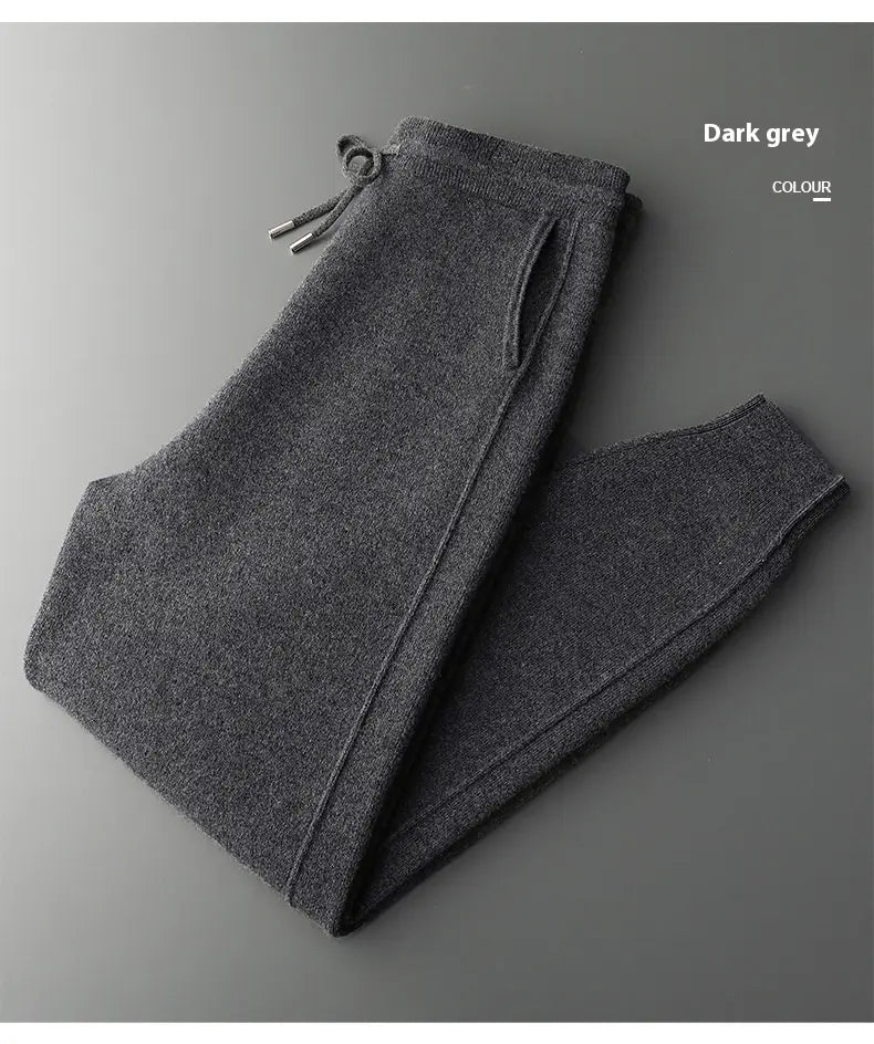 Men’s dark grey wool harem pants high waist casual joggers with a knit texture, drawstring waist, and side pockets.