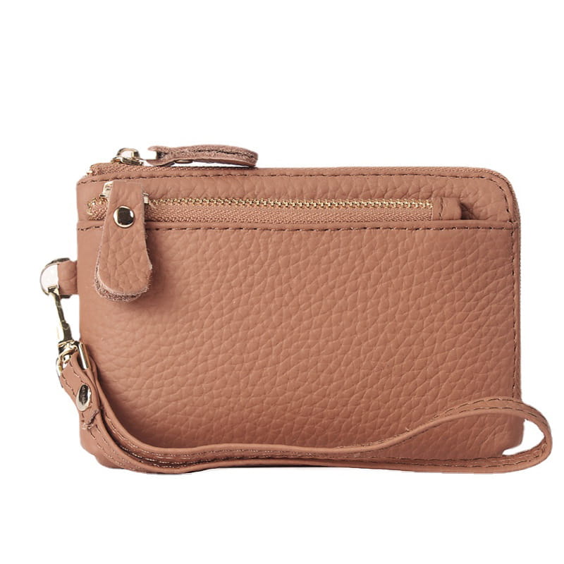 Beige textured leather wristlet wallet with gold hardware featuring a gold-tone zipper and matching strap.