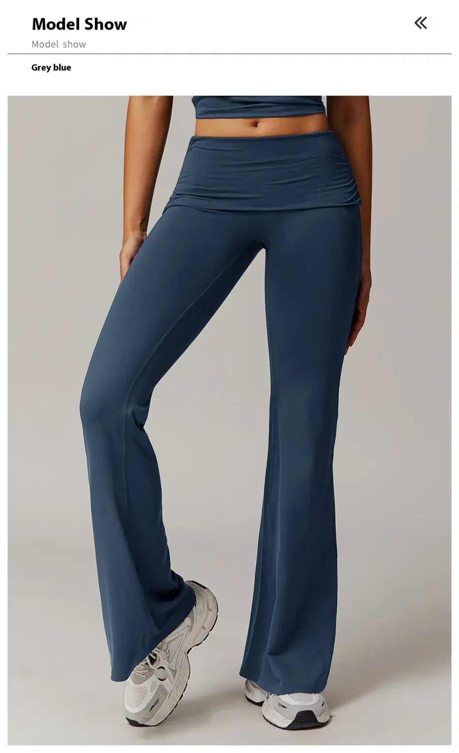 pantalones de yoga acampanados de cintura alta color gris azulado hechos de tejido liso elástico, diseñados para comodidad y flexibilidad.