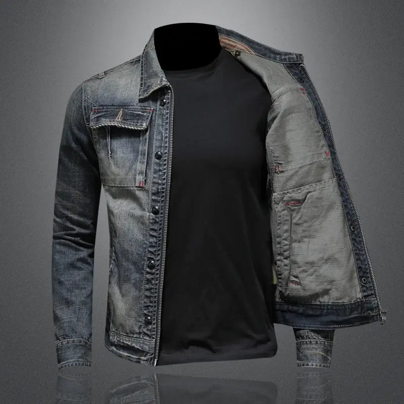 Distressed dark wash denim jacket for men featuring a faded blue color, classic collar, button closures, and two front pockets.