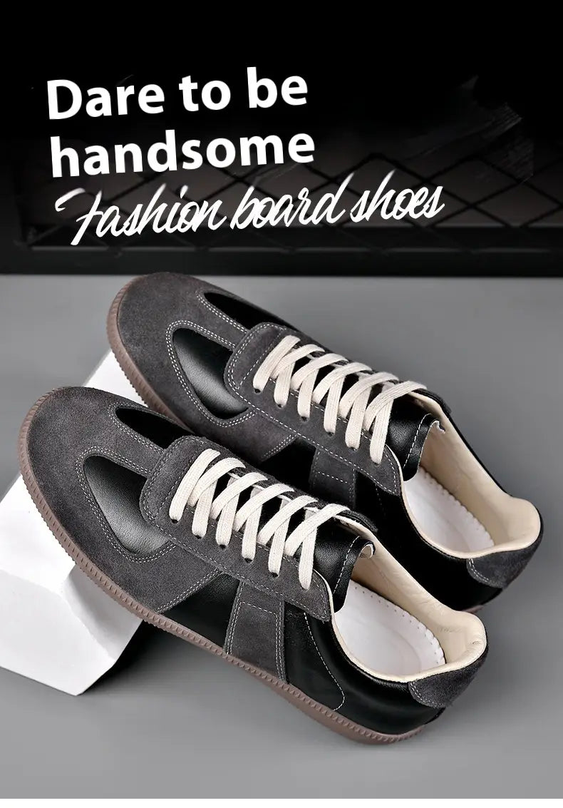 Dunkelgraue und schwarze Veloursleder- sowie Leder-Trainingsschuhe für Herren aus Deutschland mit weißen Schnürsenkeln, als lässige Sneaker gestaltet.
