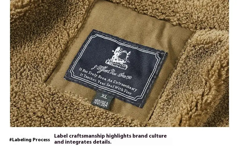 tan cotton shearling bomber jacket with shearling lining and a black embroidered label featuring white text and logo