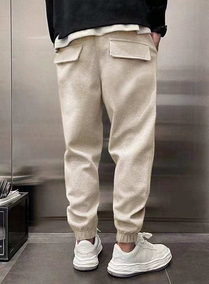 beige wool-blend men’s fleece drawstring sweatpants featuring two front pockets and elastic cuffs for comfort and style.